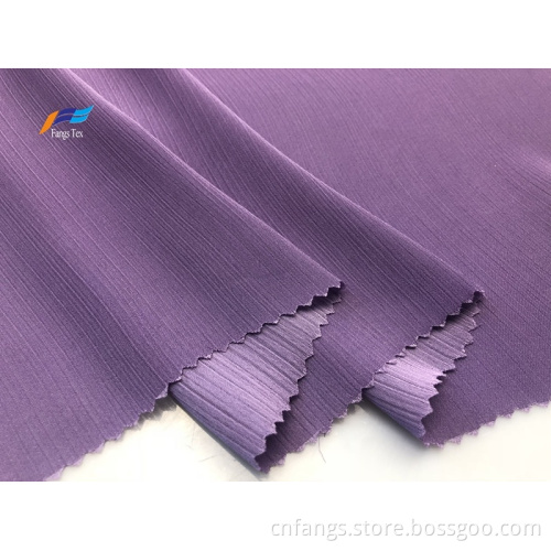 Partihandel 100% polyester crepe damklänning vävt tyg